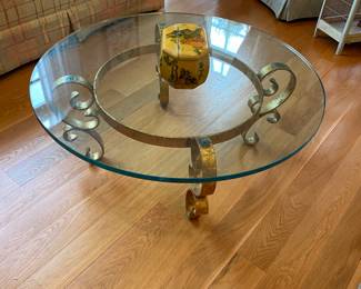 Round glass top cocktail table