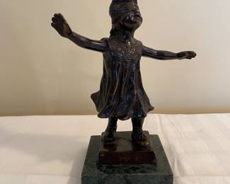 Bronze blindfolded girl sculpture