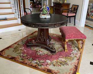 Exquisite Regency center table with gilt accents