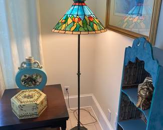 Wrought iron floor lamp with stained glass shade