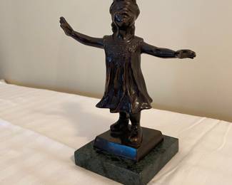 Bronze blindfolded girl sculpture