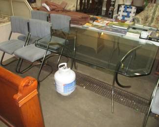 Brass and glass dining table and chairs