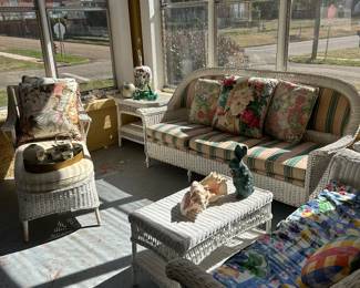 Wonderful sun porch filled with vintage wicker!