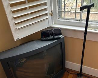 Television, alarm clock and walking stick!