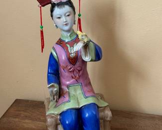 Large porcelain Asian lady with yellow bird!