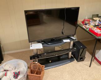 NEWER FLAT SCREEN. AND STAND