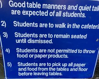 Metal Manners school sign
