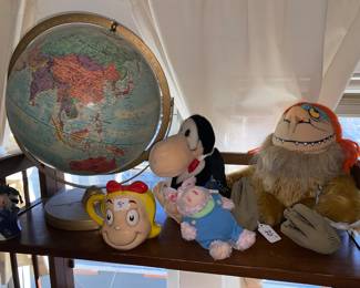 Plush dolls and globe