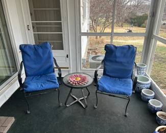 wrought iron chairs with cushions