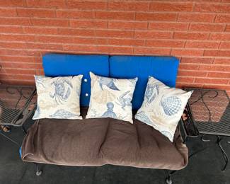 wrought iron double seat with two side tables