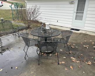 wrought iron round table and 4 chairs