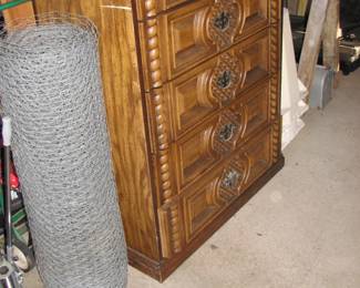 dresser and a roll od fencing