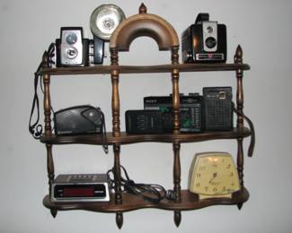 vintage cameras, small radios and clocks