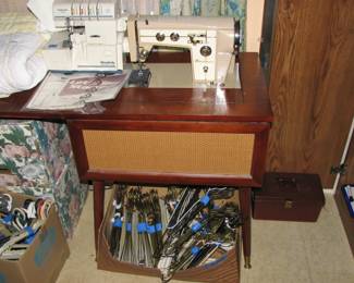 Kenmore machine in a mid century cabinet