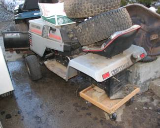 rear end is out of this one, it has a plow blade on it and the deck is behind it.