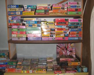 HUNDREDS of puzzles in this sale