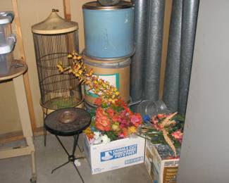 silk flowers, bird cage, vintage ash tray and old cardboard drums