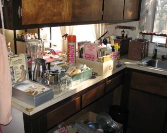 cookbooks, vintage mixer with box and a Dunkin Donuts Thermos