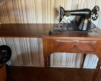 Vintage sewing machine and cabinet