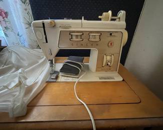 Sewing machine with cabinet