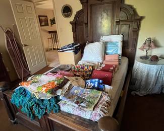 Antique bed with linen display