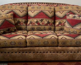 Southwest Sofa Bed with Rolled Arm and Nailhead Accent