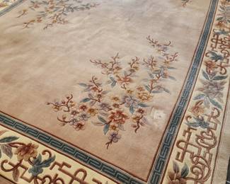 Sculptured high relief, wool oriental area rug. Measures 9' x 12'.