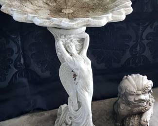 Beautiful bird bath and garden statue.