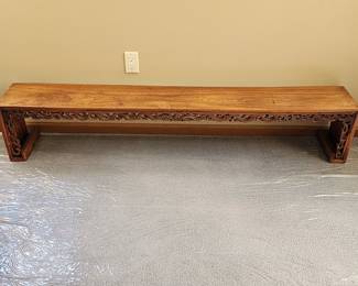 Chinese ribbon table, originally part of a Chinese temple door. Measures 69.75" wide x 10.5" deep x 13" high.