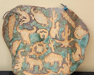 Carole Schoendorfer multi-western shapes wall hanging.