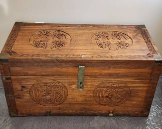 Carved Korean Cedar Chest. Measures 40" wide x 20" High x 19.5" deep.