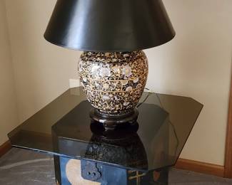 Lacquer chest and oriental lamp.