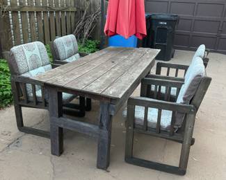 Wood Outdoor patio furniture harvest table with four chairs and cushions