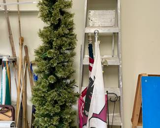 skinny 7 foot tree, aluminum ladder