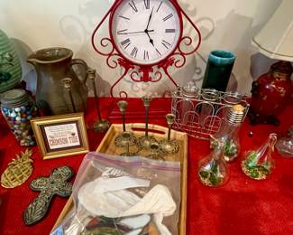 large red clock, brass items, 