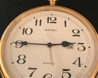 27 - $34 Seiko pocket watch style desk clock.