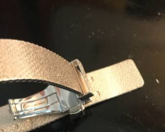 8- Dior - Christian Dior - Model D Dior, large model 25mm, stainless steel bracelet, and bezel pink gold and diamond, red lacquer face. $3,600