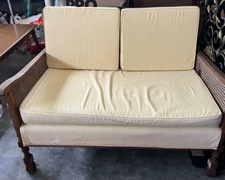 Rattan cushioned loveseat