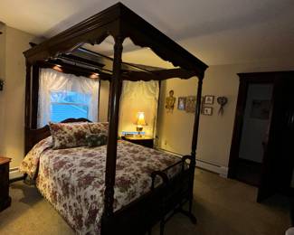 Four post bed with reading lights