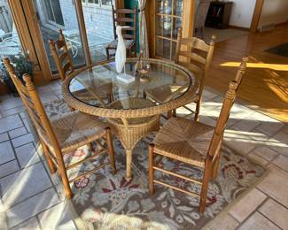 Wicker and glass breakfast table and chairs