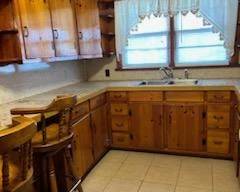 3 bedroom, 2 bath brick home located between Kernersville and Winston Salem. Hardwood floors, full basement, 2 car carport, outdoor storage building. Close to Winston Salem, Kernersville and High Point. Auction will be held at 12:00 noon.