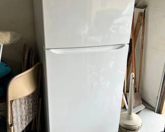 This refrigerator is sold but there is a white one in the kitchen that is for sale