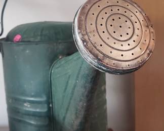 Vintage watering can. Galvanized and brass