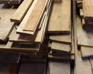 Juniper lumber.  Some is raw and some is finished.  Some has live edge.