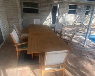 Adjustable teak wood table and 6 teak and canvas chairs