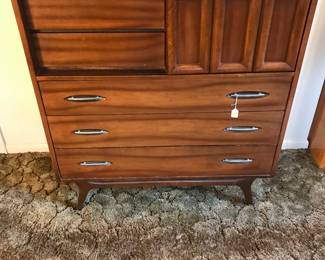 Mcm dresser has sliding front top panel!