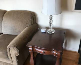 One of 2 matching solid wood end tables! There is a matching console table and even a smaller pedestal too! Lamps of various style too!