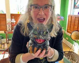 I literally screamed when I unpacked this black cat on a fence!