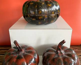 A collection of 18th century bronze and wood Thai Buddha figures