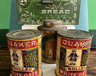 Antique advertising tins and cardboard containers: G&P bread, McLaughlin Coffee, Quaker, CR Tartar, Wag Coffee, Schepp’s Cocoanut, A&P Coffee, Eslinger honey, Louvain Coffee, Gold Bond A1 Coffee, Thomas J Webb Coffee, CW Coffee, SE Johnson powdered dancing wax, Tropic Aroma Coffee, Maxwell House Coffee, Forbes Quality Coffee, Great American pepper, Rich’s Canton Ginger, Ferndall Coffee, Bravo Coffee, Mrs. Stewart’s liquid bluing, Ideal Not-A-Seed Raisins, Cracker Jack, Calumet Baking Powder, Golden Rule Cocoa, Watkins Baking Powder, Back Diamond Cod, Bermont Whiskey, Brach’s Supreme Marshmallows, Planters Pennant Peanuts, Bunny Rolled Oats, A&P cloves spice tins, Heinz, Ivin’s biscuits, Crisp
